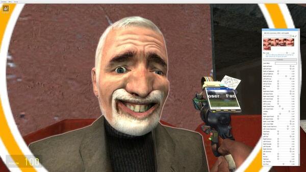Screenshot from Garry's Mod showing a player using a tool gun aimed at a character in a suit near a brick wall.