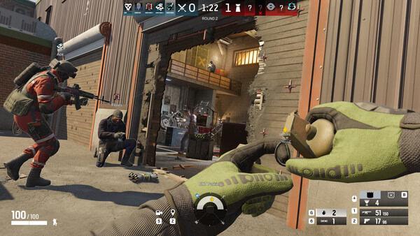 Screenshot from Tom Clancy's Rainbow Six Siege. Players prepare to breach a wooden structure with weapons and a grenade in hand.