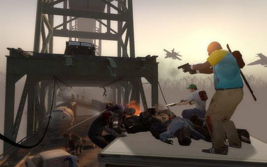 Left 4 Dead 2 screenshot: Survivors battle zombies atop a vehicle on a bridge, with jets flying overhead in a tense scene.