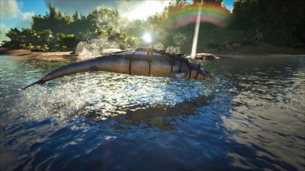 Screenshot from ARK: Survival Evolved showing a fish-like creature jumping over water with a rainbow in the background.