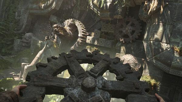 Screenshot from Indiana Jones and the Great Circle showing ancient, overgrown machinery with gears amidst a lush jungle setting.