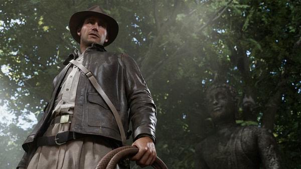 Screenshot from Indiana Jones and the Great Circle showing Indiana Jones holding a whip in a forest with a statue in the background.