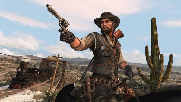 Screenshot from Red Dead Redemption showing a cowboy on horseback aiming a revolver, with a steam train and cactus in the background.
