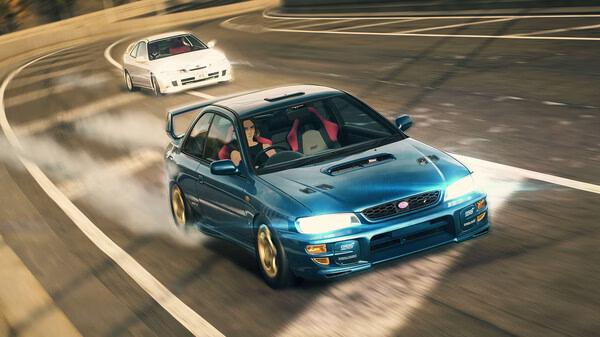 Screenshot from Need for Speed Unbound showing two cars drifting on a curved highway, with a blue car leading a white one.