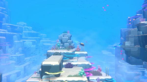 Screenshot from DAVE THE DIVER showing an underwater scene with coral reefs, vibrant fish, and a diver exploring the ocean depths.