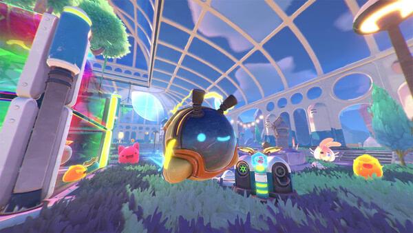 Slime Rancher 2 screenshot: A glowing slime wearing a helmet is surrounded by colorful slimes in a futuristic, glass-domed environment.