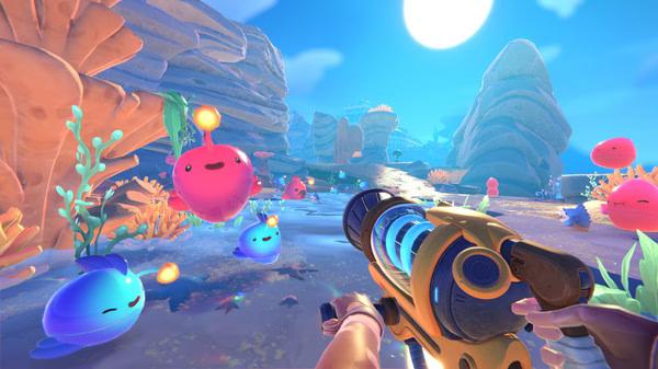 Screenshot from Slime Rancher 2 showing a player with a vacpack surrounded by colorful slimes in a vibrant, rocky landscape.
