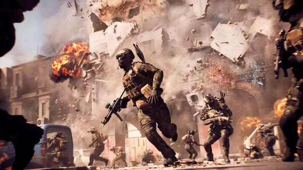 Battlefield 6 screenshot: Soldiers charge through a war-torn city as explosions and debris fill the chaotic battlefield.