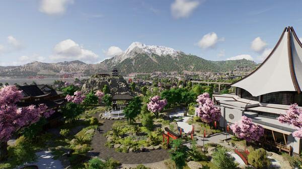 Screenshot from Jurassic World Evolution 3 showing a park landscape with cherry blossom trees, a mountain backdrop, and modern buildings.