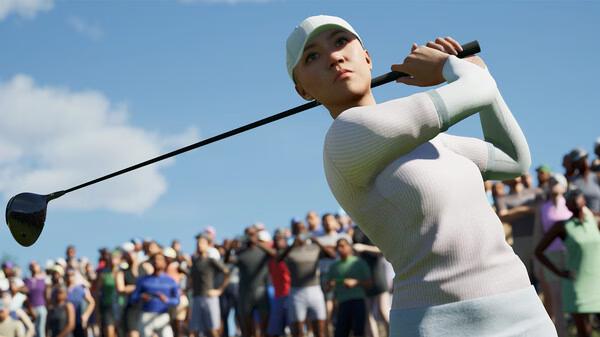 Screenshot from PGA TOUR 2K25 showing a golfer swinging a club with a cheering crowd in the background on a sunny day.