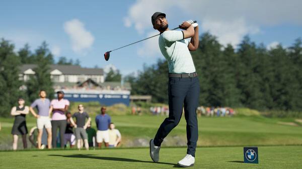 PGA TOUR 2K25 screenshot: A golfer in mid-swing on a sunny course, while spectators watch in the background.
