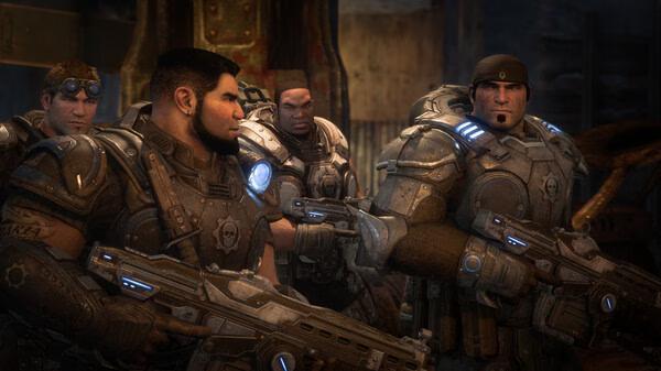 Screenshot from Gears of War: Reloaded showing four armored soldiers holding weapons in a dimly lit, industrial setting.