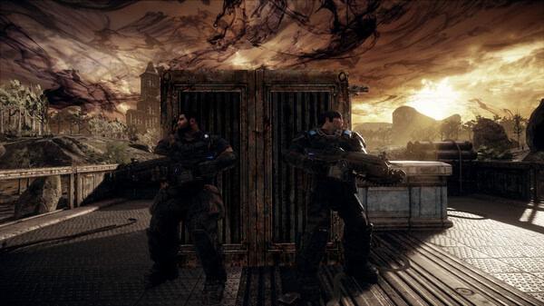Gears of War: Reloaded screenshot showing two armored soldiers taking cover behind a crate on a battle-scarred bridge at sunset.