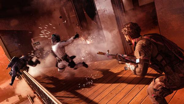 Screenshot from Call of Duty: Black Ops 7 shows a player character firing at enemies on a wooden platform amidst intense action.