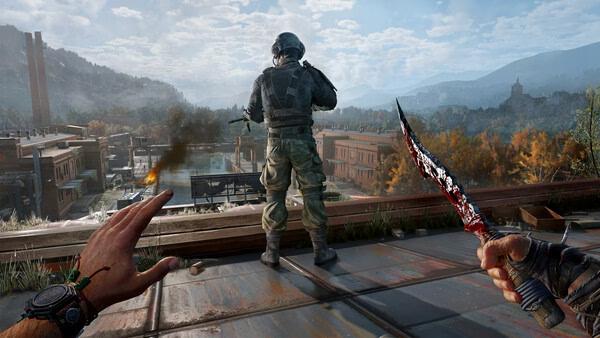 Screenshot from Dying Light: The Beast showing a player character on a rooftop with a knife, overlooking a city landscape.
