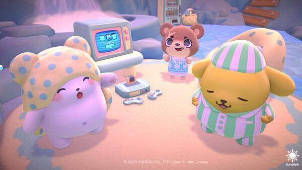 Screenshot from Hello Kitty Island Adventure showing cute characters in pajamas gathered around a retro gaming console in a cozy room.