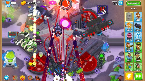 Bloons TD 6 screenshot showing intense tower defense gameplay with monkey heroes and upgrades battling waves of bloons.