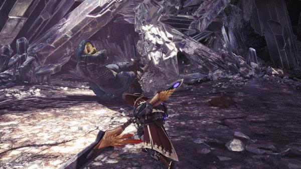 Screenshot from Monster Hunter: World showing a hunter wielding a weapon facing off against a large monster in a crystal cavern.
