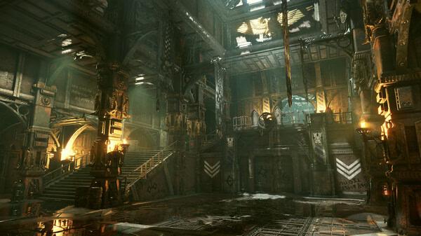 Warhammer 40,000: Darktide screenshot featuring a dimly lit, ornate industrial hall with stairs and intricate metalwork.