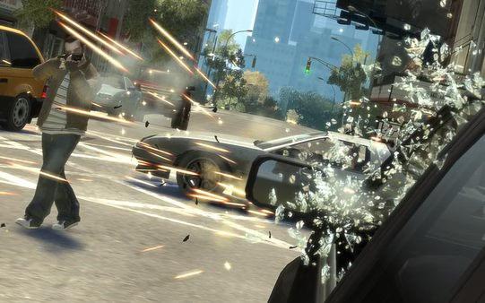Grand Theft Auto IV screenshot: A car crash with shattered glass and sparks flying, while a man takes photos in a bustling city street.