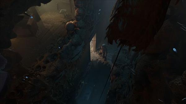 Screenshot from Half-Life: Alyx showing a dimly lit, alien-infested corridor with a figure standing near a lighted doorway.
