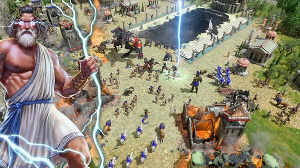 A game screenshot from Age of Mythology: Retold showing a battle scene with mythological creatures and a towering Zeus figure.