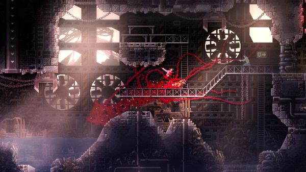 CARRION screenshot: The creature navigates an industrial area with metal walkways and large fans in the background.