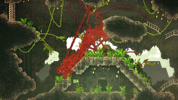 Screenshot from CARRION showing the red, tentacled monster moving through a cave-like environment filled with greenery and stone structures.