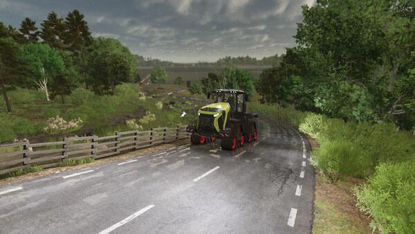 Farming Simulator 25 screenshot: A tractor drives along a winding road surrounded by lush greenery and a cloudy sky.