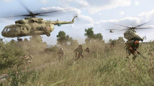 Soldiers advance through grassy terrain as helicopters hover overhead in this Arma Reforger screenshot.