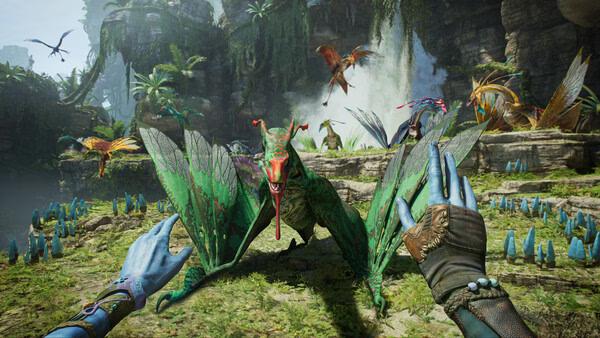 A screenshot from Avatar: Frontiers of Pandora showing a player interacting with a vibrant green creature in a lush jungle setting.