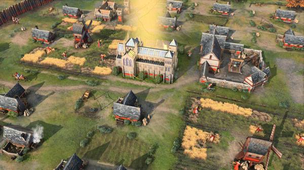 Age of Empires IV screenshot showing a medieval village with farms, houses, windmills, and a central church bathed in sunlight.