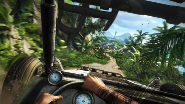 Far Cry 3 screenshot: Player's view from a speeding jeep on a lush, tropical island path, with jungle and distant mountains visible.