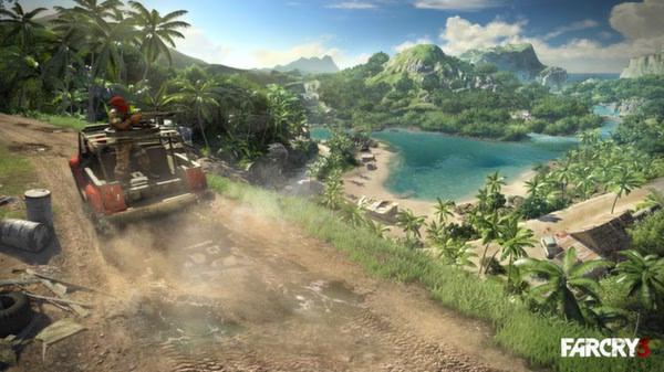 Far Cry 3 screenshot: An off-road vehicle drives down a dirt path overlooking a tropical beach and lush green mountains.