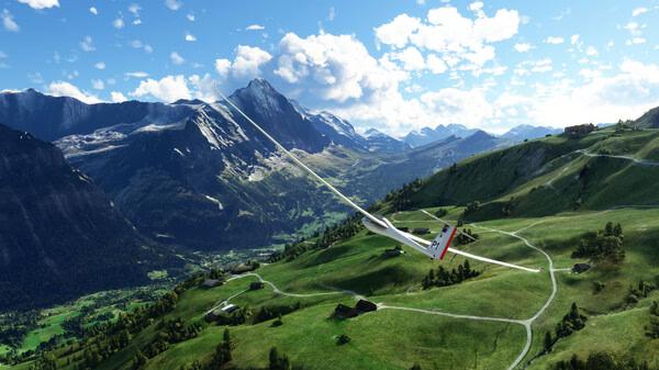 A screenshot from Microsoft Flight Simulator 2020 shows a glider soaring over lush green hills and snow-capped mountains.