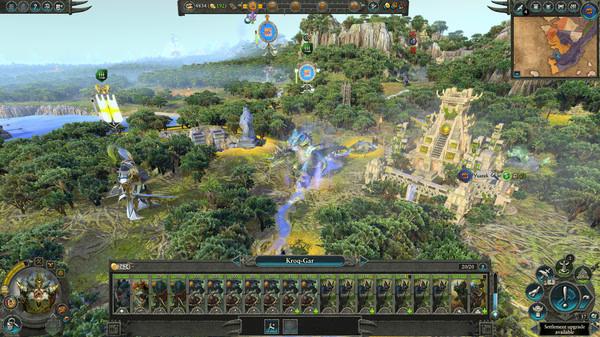 Screenshot from Total War: WARHAMMER II showing Kroq-Gar's army and a lush jungle settlement surrounded by detailed terrain.