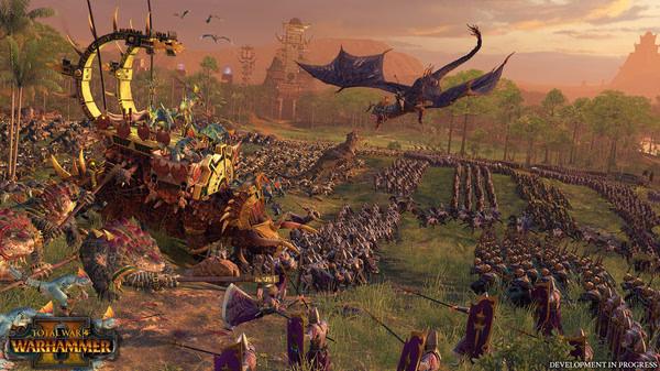 Total War: WARHAMMER II screenshot showing a battlefield with armies clashing, a dragon flying, and a large war machine.
