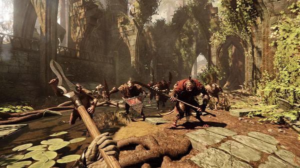 Screenshot from Warhammer: Vermintide 2 showing players battling Skaven in a lush, overgrown medieval courtyard.