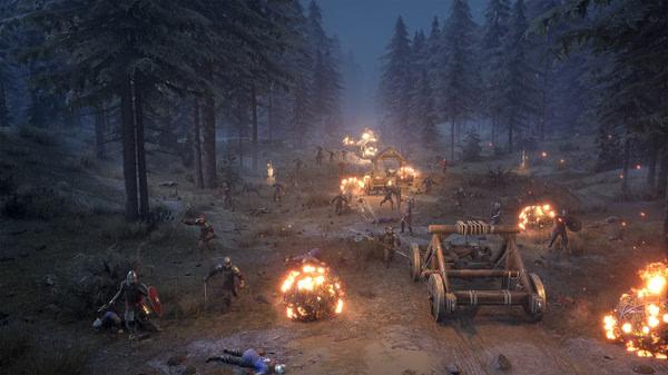Chivalry 2 screenshot: Warriors clash in a forest at night, surrounded by catapults and fire, creating a chaotic medieval battle scene.