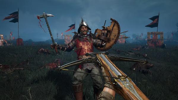 Chivalry 2 screenshot: A knight in armor wields a weapon and shield, advancing through a battlefield strewn with debris and flags.