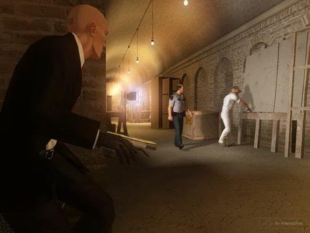 Hitman: Blood Money screenshot: Agent 47 crouches in a dimly lit corridor, observing two workers in a brick-walled area.