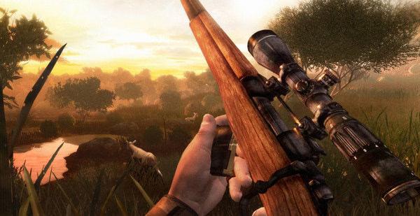 A Far Cry 2 screenshot showing a player's hand holding a sniper rifle, aimed at wildlife in a grassy, sunlit savanna landscape.