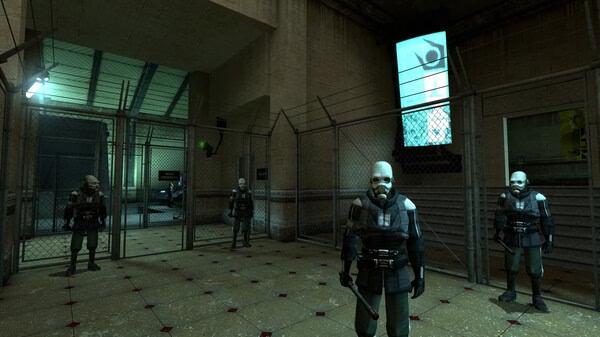 Half-Life 2 screenshot: Four masked Combine soldiers stand in a fenced-off area inside a dimly lit industrial building.
