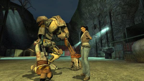 Half-Life 2 screenshot: A woman stands next to a large robot in a dimly lit industrial area, surrounded by rocky cliffs.