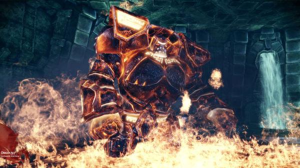 Screenshot from Dragon Age: Origins showing a towering golem surrounded by flames in a stone chamber.