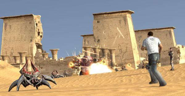 A screenshot from Serious Sam 3: BFE showing the player facing alien enemies in a desert setting near ancient ruins.