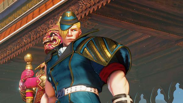Street Fighter V screenshot showing a character in a blue military outfit standing in front of a statue in a vibrant temple setting.