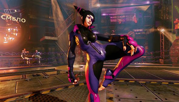 Street Fighter V screenshot: A character in a purple and black outfit strikes a dynamic pose in an industrial arena.