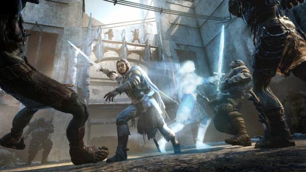 Middle-earth: Shadow of Mordor screenshot showing Talion fighting multiple foes, aided by a glowing wraith in a fortress setting.