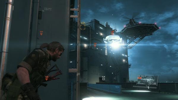 A screenshot from Metal Gear Solid V: The Phantom Pain shows a soldier sneaking near a platform with a helicopter overhead.